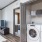 a room with a washing machine and a tv
