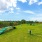 a grassy field with a slide