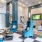 a room with blue chairs and a white and black floor