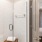 a bathroom with a glass shower