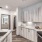 a kitchen with a marble counter top