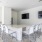a dining room with a table and chairs