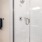 a shower with a glass door